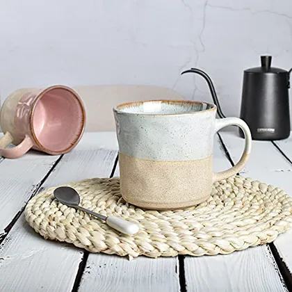 A Bosmarlin mug in a reactive glaze