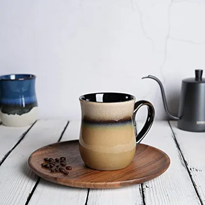 A Bosmarlin mug in a reactive glaze