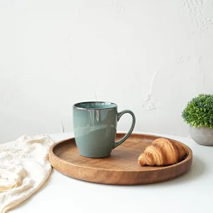 A Bosmarlin mug in a reactive glaze