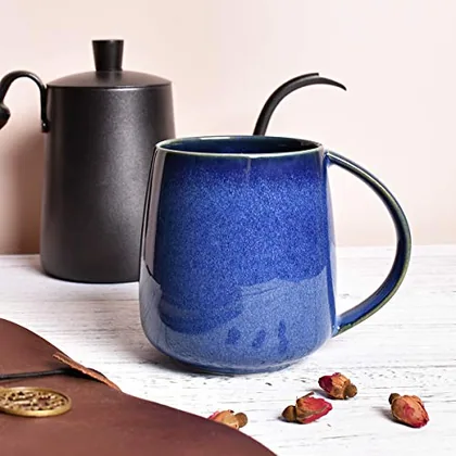 A Bosmarlin mug in a reactive glaze