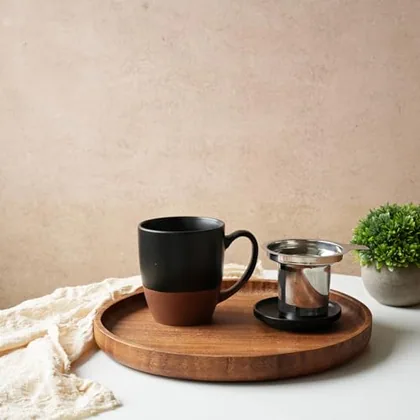 A Bosmarlin mug in a reactive glaze