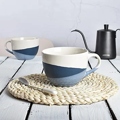 A Bosmarlin mug in a reactive glaze