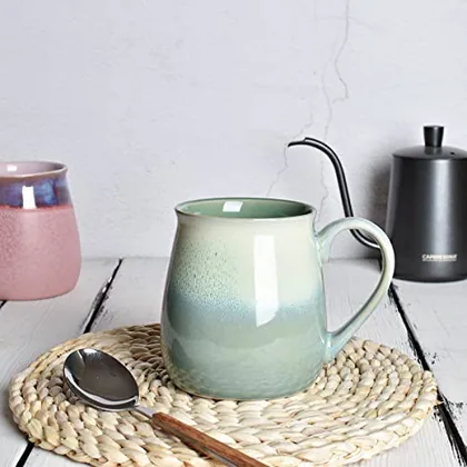 A Bosmarlin mug in a reactive glaze