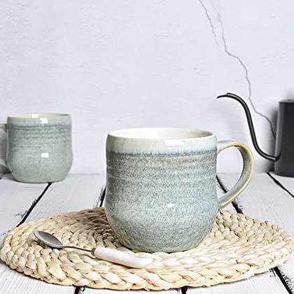 A Bosmarlin mug in a reactive glaze