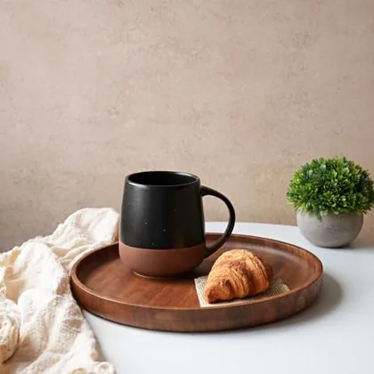 A Bosmarlin mug in a reactive glaze