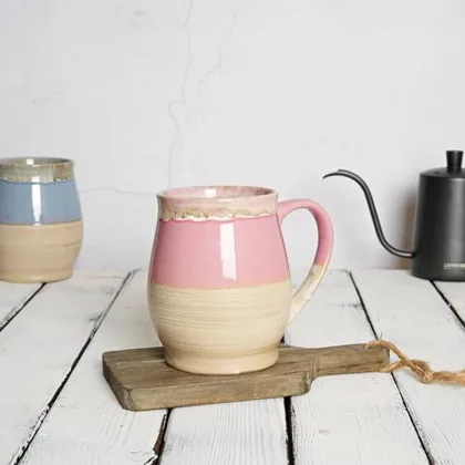 A Bosmarlin mug in a reactive glaze