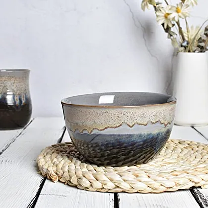A Bosmarlin mug in a reactive glaze