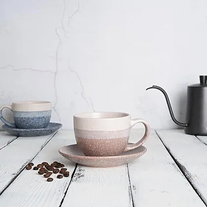 A Bosmarlin mug in a reactive glaze