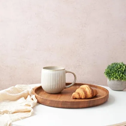 A Bosmarlin mug in a reactive glaze