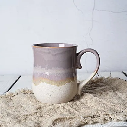 A Bosmarlin mug in a reactive glaze