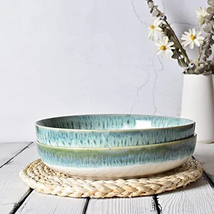 A Bosmarlin mug in a reactive glaze