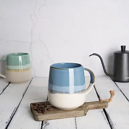 A Bosmarlin mug in a reactive glaze