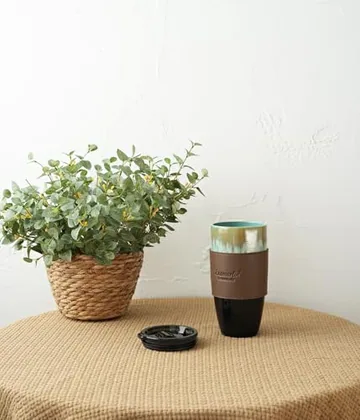 A Bosmarlin mug in a reactive glaze