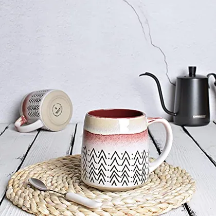 A Bosmarlin mug in a reactive glaze