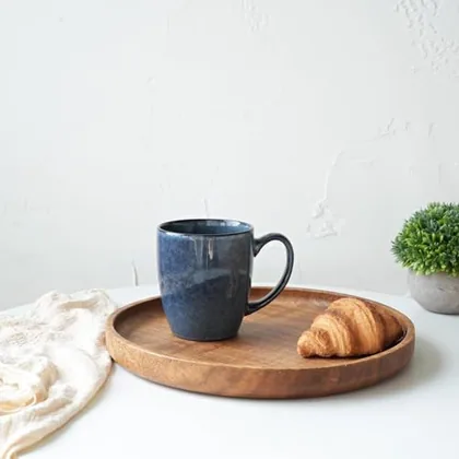 A Bosmarlin mug in a reactive glaze