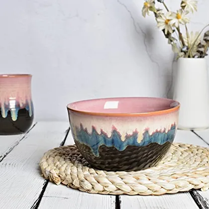 A Bosmarlin mug in a reactive glaze