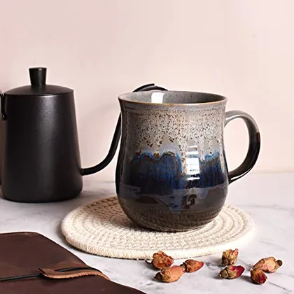 A Bosmarlin mug in a reactive glaze