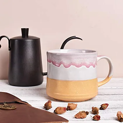 A Bosmarlin mug in a reactive glaze