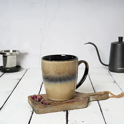 A Bosmarlin mug in a reactive glaze