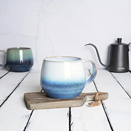 A Bosmarlin mug in a reactive glaze