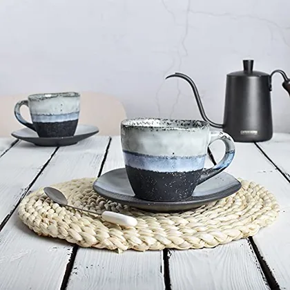 A Bosmarlin mug in a reactive glaze