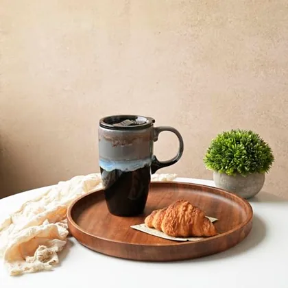 A Bosmarlin mug in a reactive glaze