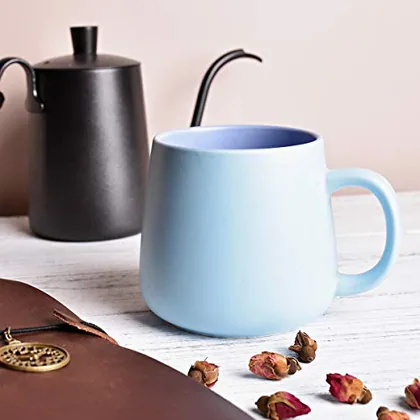 A Bosmarlin mug in a reactive glaze
