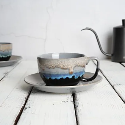 A Bosmarlin mug in a reactive glaze