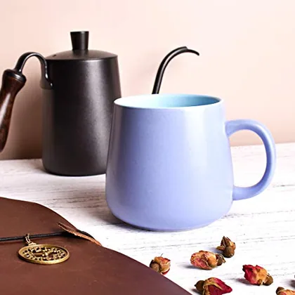 A Bosmarlin mug in a reactive glaze