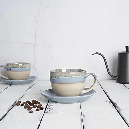 A Bosmarlin mug in a reactive glaze