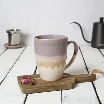 A Bosmarlin mug in a reactive glaze
