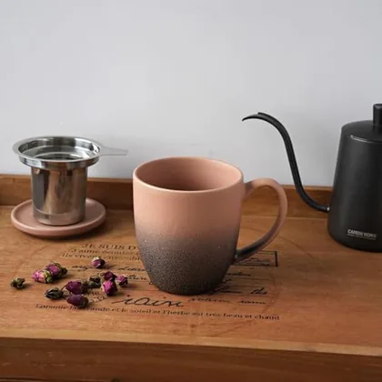 A Bosmarlin mug in a reactive glaze