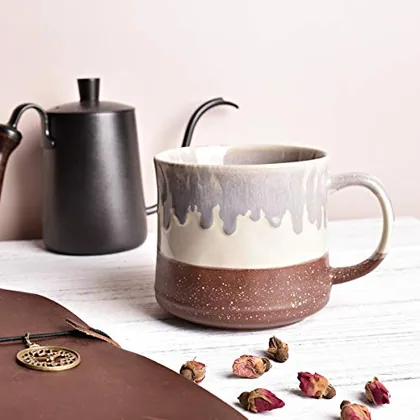 A Bosmarlin mug in a reactive glaze