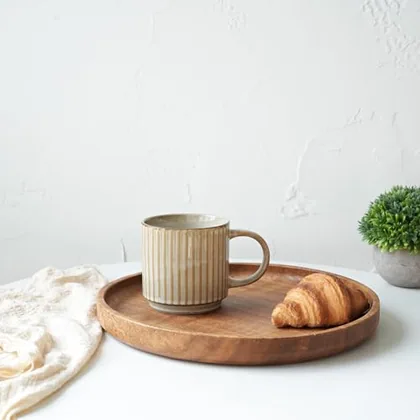 A Bosmarlin mug in a reactive glaze