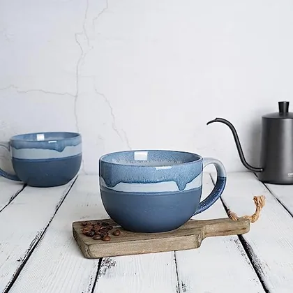 A Bosmarlin mug in a reactive glaze