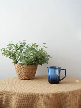 A Bosmarlin mug in a reactive glaze