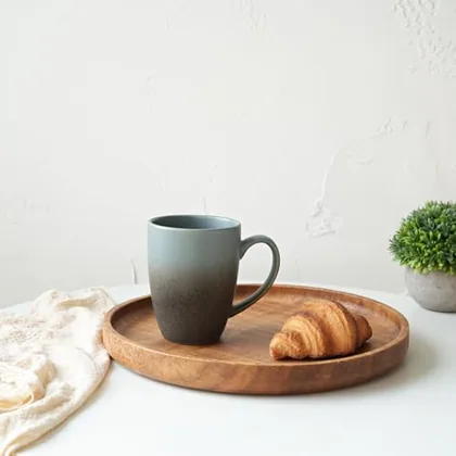 A Bosmarlin mug in a reactive glaze