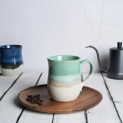 A Bosmarlin mug in a reactive glaze