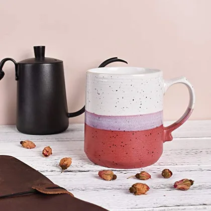 A Bosmarlin mug in a reactive glaze
