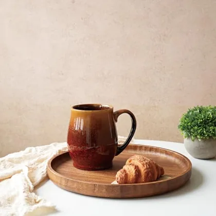 A Bosmarlin mug in a reactive glaze