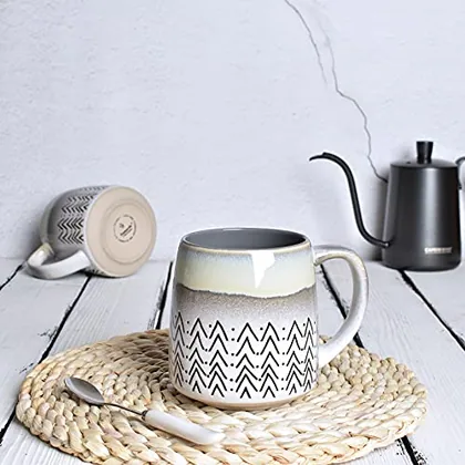 A Bosmarlin mug in a reactive glaze