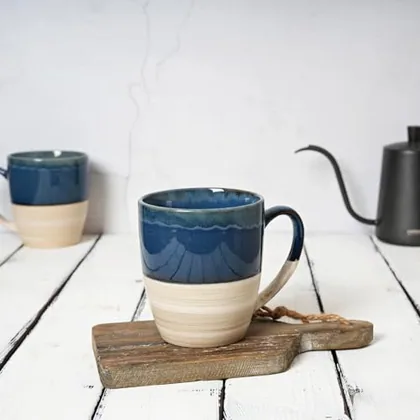 A Bosmarlin mug in a reactive glaze