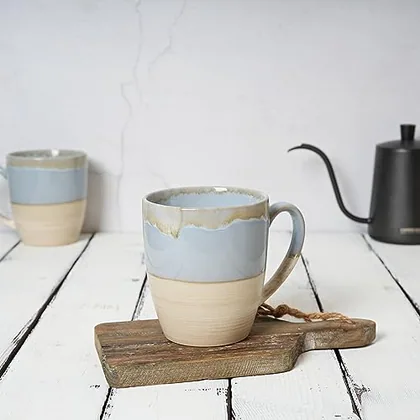 A Bosmarlin mug in a reactive glaze