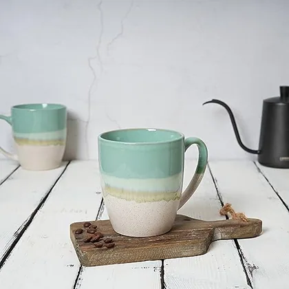A Bosmarlin mug in a reactive glaze