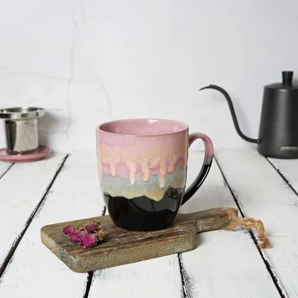 A Bosmarlin mug in a reactive glaze