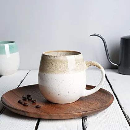 A Bosmarlin mug in a reactive glaze