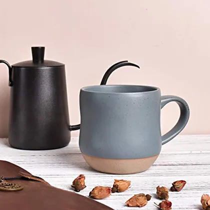 A Bosmarlin mug in a reactive glaze