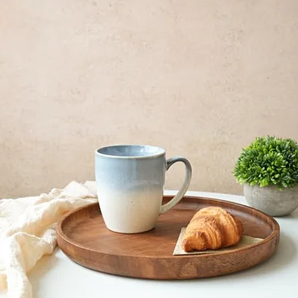 A Bosmarlin mug in a reactive glaze