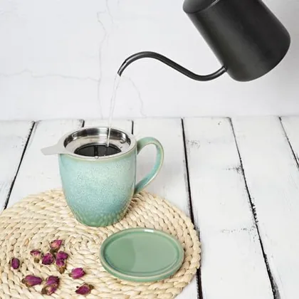 A Bosmarlin mug in a reactive glaze
