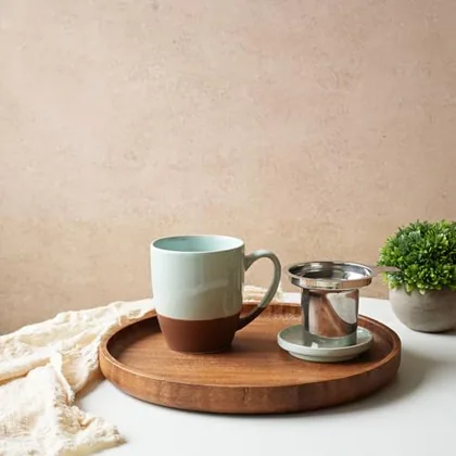 A Bosmarlin mug in a reactive glaze